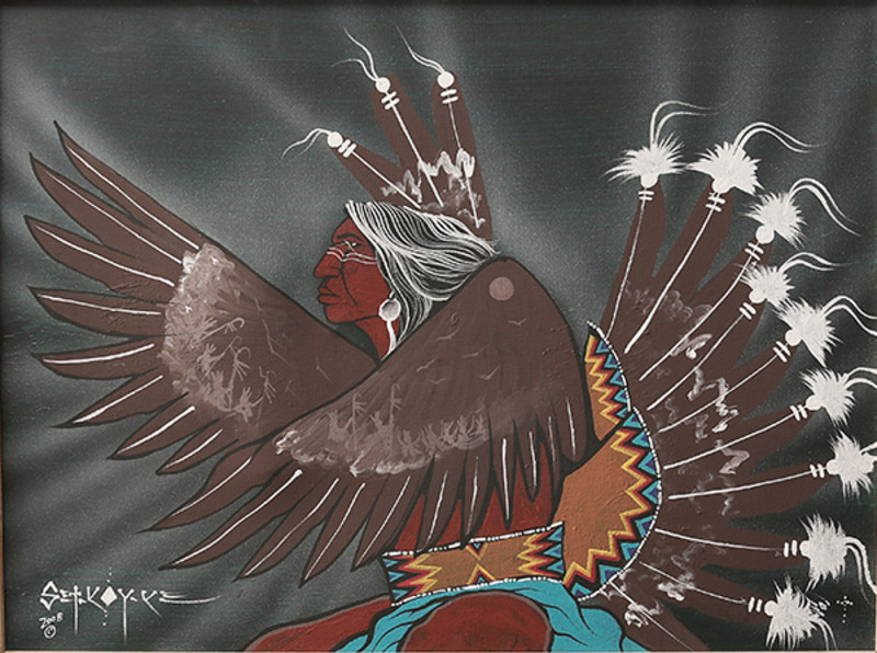 Traditional dancer in eagle feather cape