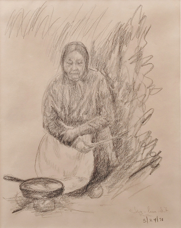 Woman cooking over fire