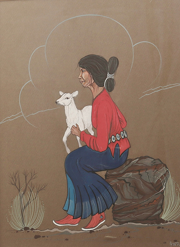 Navajo shepherdess holding lamb