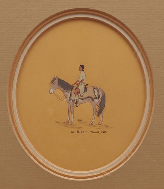 Woman sitting on horse